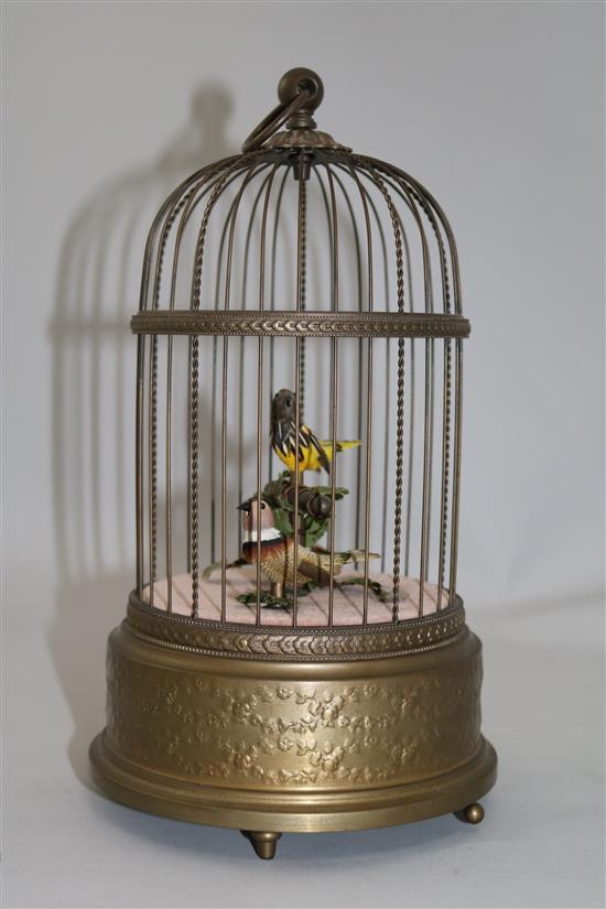 A mid 20th century musical brass birdcage automaton by Reuge Music, Saint-Croix, Switzerland, 11.25in.